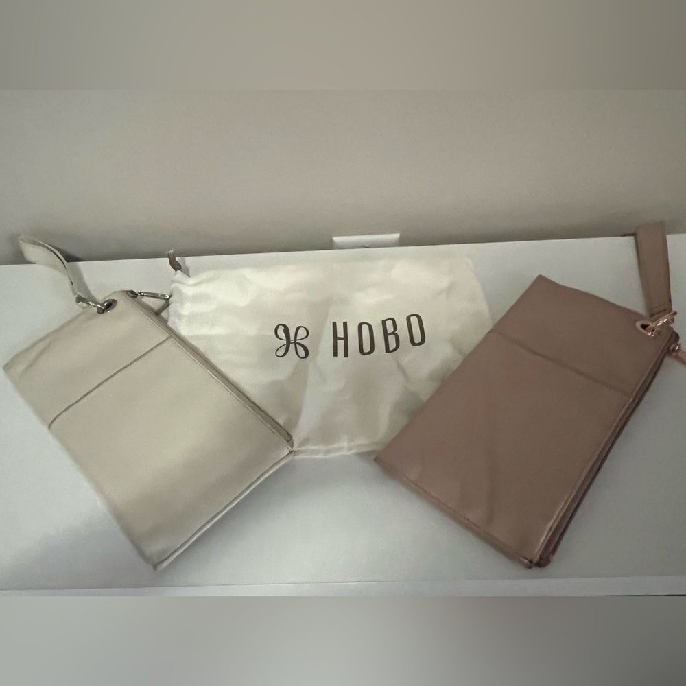 2 Hobo wristlets, cream color and a rose gold color